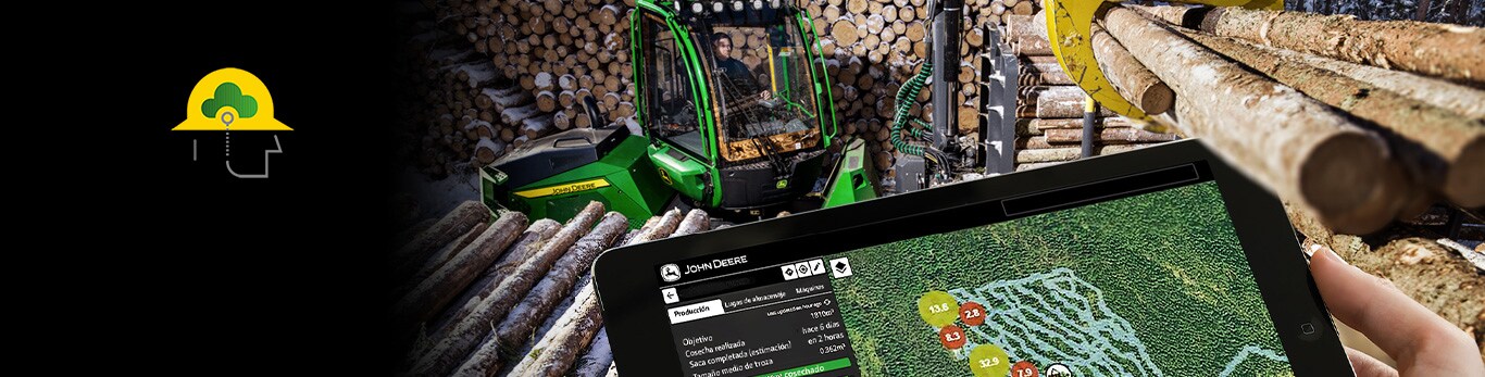 John Deere Forstmaschin und ein Tablet Computer